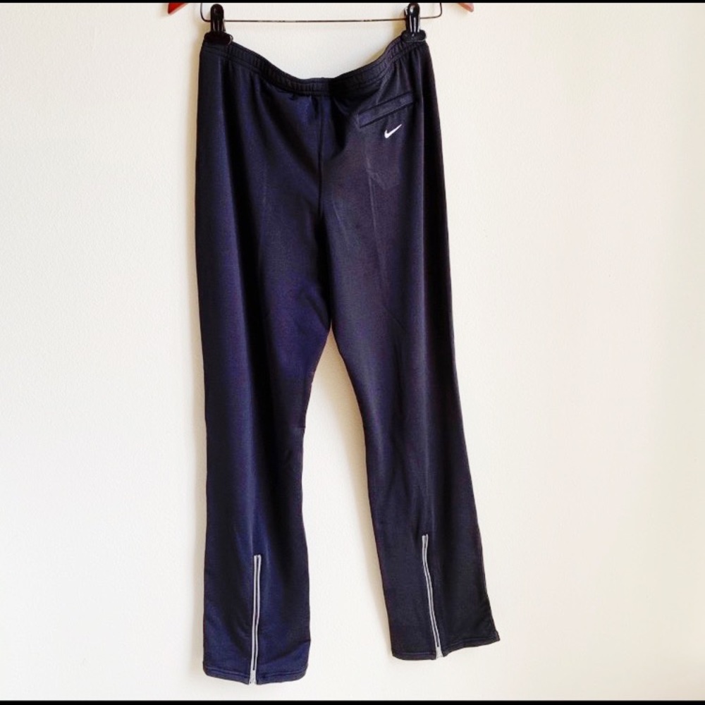 Nike DRI Fit Black with zipper in the back Size M